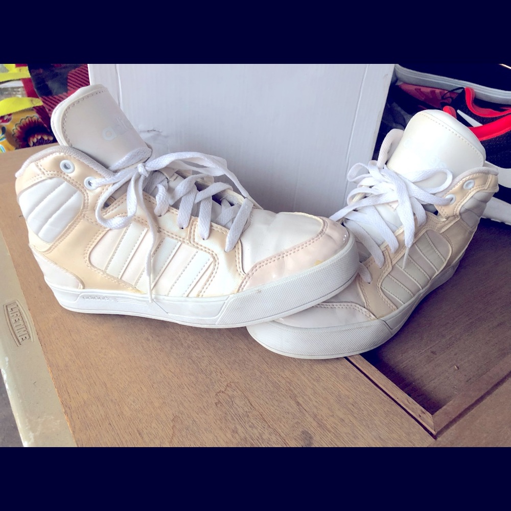 Cream colored Adidas hightops in size 7.5